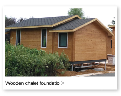 Wooden chalet foundation
